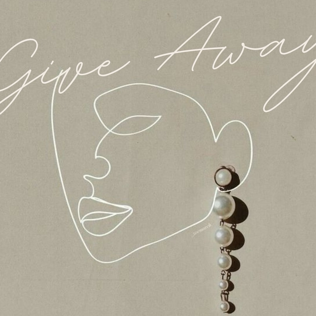 Drawing of face with "Give Away" written above it, pair of pearl earrings hanging from drawn ear
