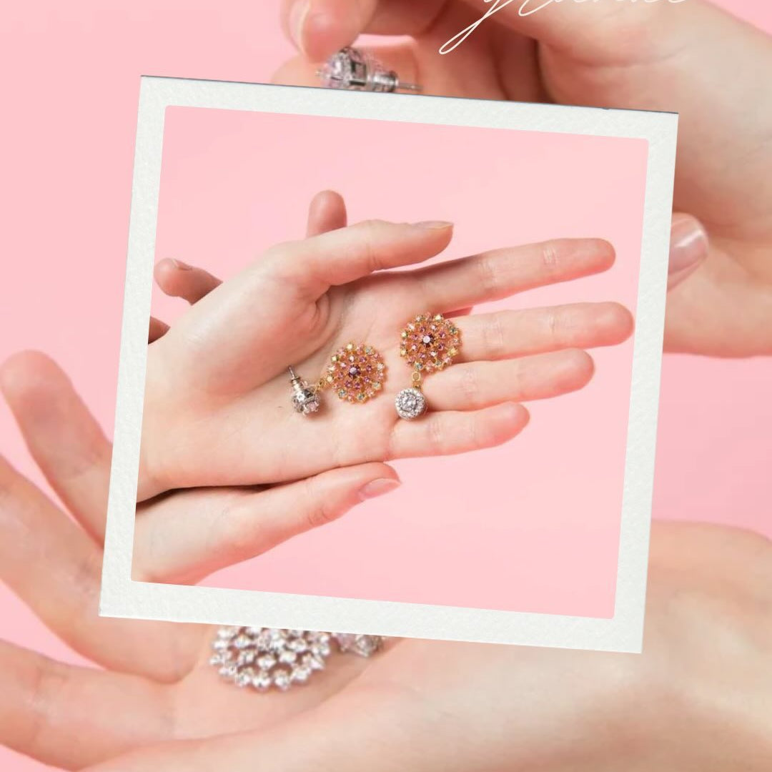 Fireworks Earring Jackets held in hands on pink background