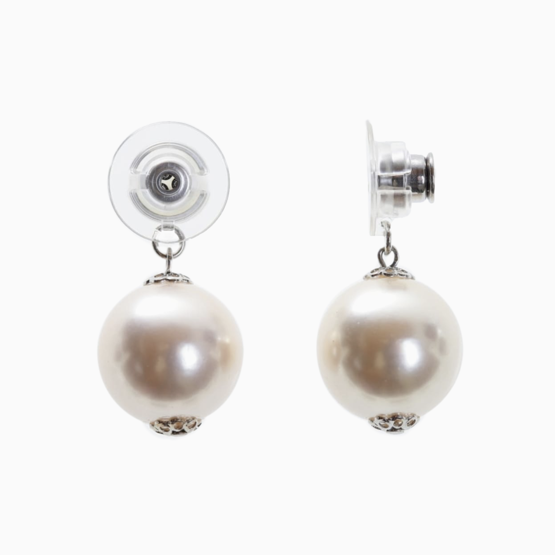 gorgeous Swarovski white pearl jackets powered by Chrysmela's locking back add glamour to diamond studs, and any other earrings you have to expand your earring wardrobe infinitely instantly . It's not rigid but slightly moves as you move, adding charm to your ZOOM meeting outfit