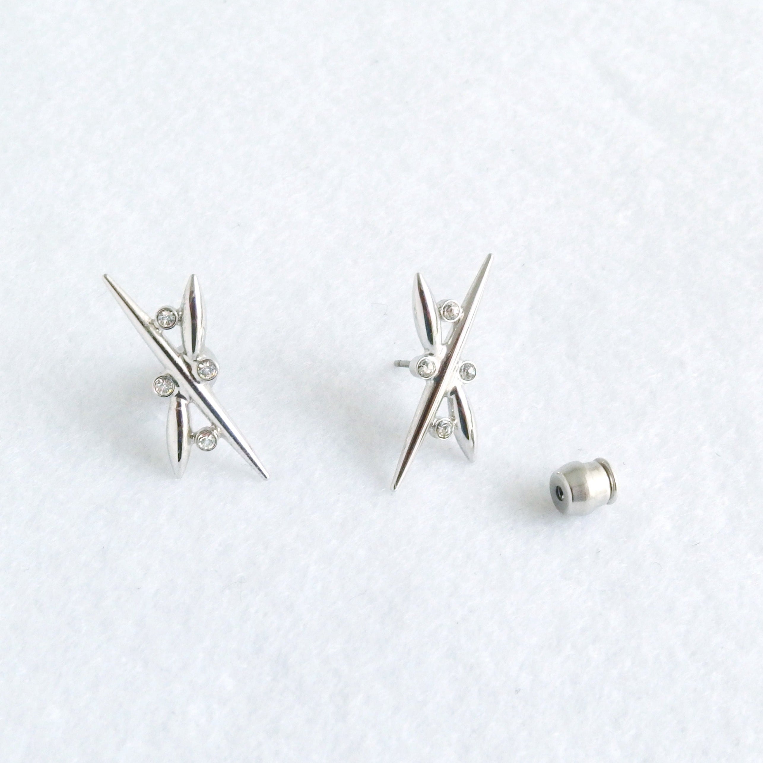 Neuron Full Earring Set comes with a beautiful  "X" (love) stud earring which you can enjoy solo, or with any jackets from  Chrysmela collections.  A perfect travel jewelry that expands your earring wardrobe with ease.   